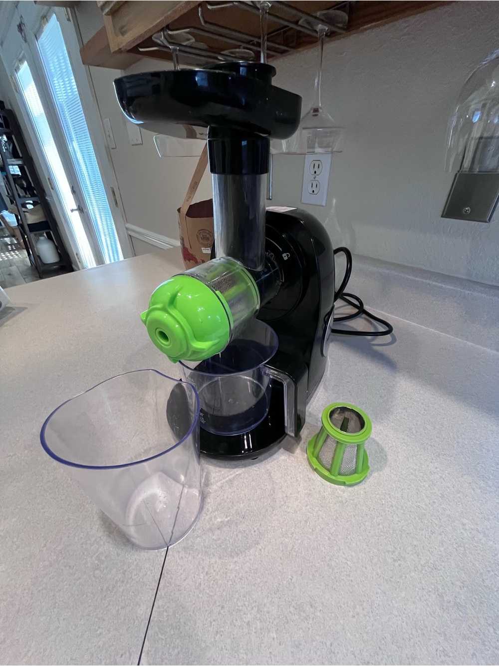 Compact Black Cold Press Juicer with Lime Green Accents